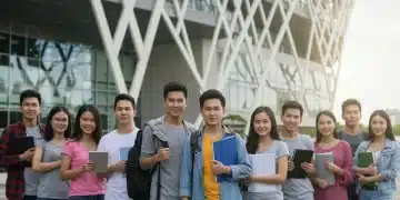 Students preparing for 2026 graduate school admissions with modern university in background
